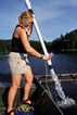 Trout Lake Station: Student staff Karlyn Langjahr conducting limnology research on Trout Lake.